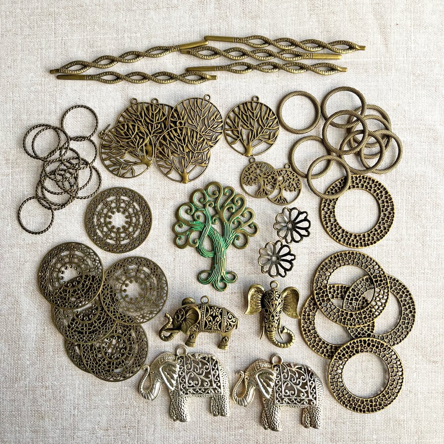 Stash of jewellery findings, pendants, charms, mixed media materials