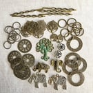 Stash of jewellery findings, pendants, charms, mixed media materials