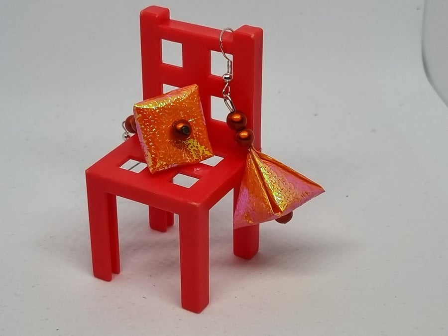 Pyramid-shaped origami earrings:  orange iridescent paper and miracle beads 