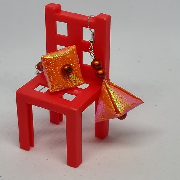 Pyramid-shaped origami earrings:  orange iridescent paper and miracle beads 