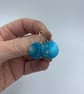 Turquoise anodised aluminium ammonite circle earrings - Image 2
