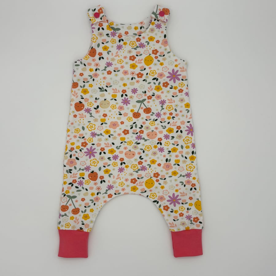 Summer fruits and flowers on white handmade baby romper