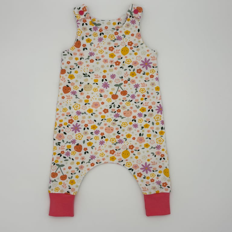 Summer fruits and flowers on white handmade baby romper