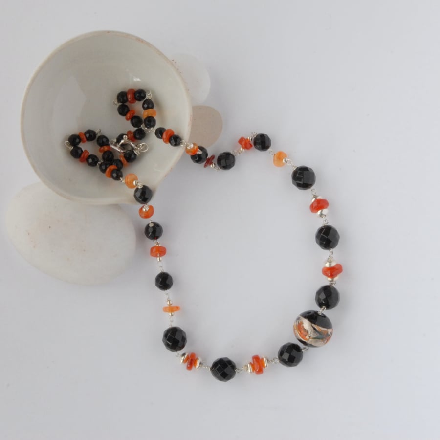 Black and orange murano glass and sterling silver necklace