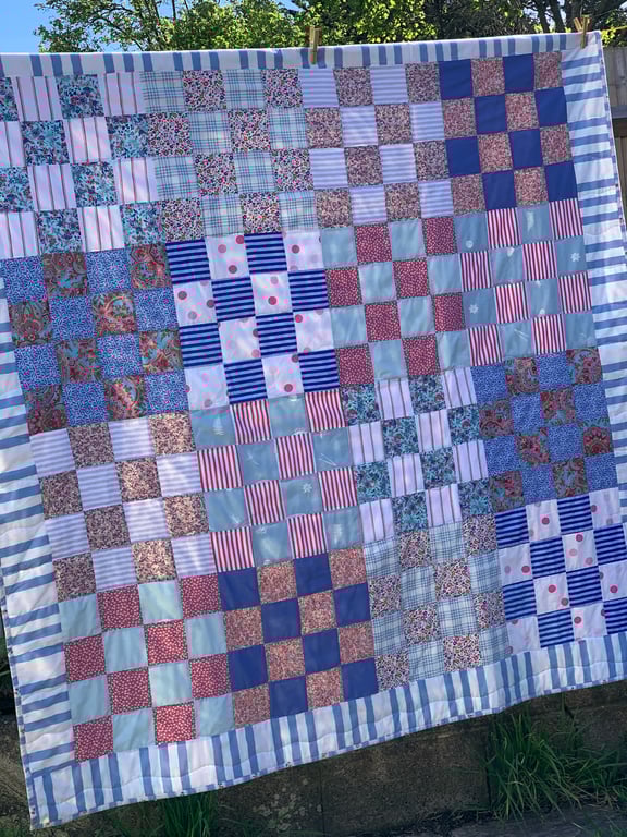 Pink and blue checkerboard quilt