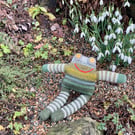 Frog had knitted doll