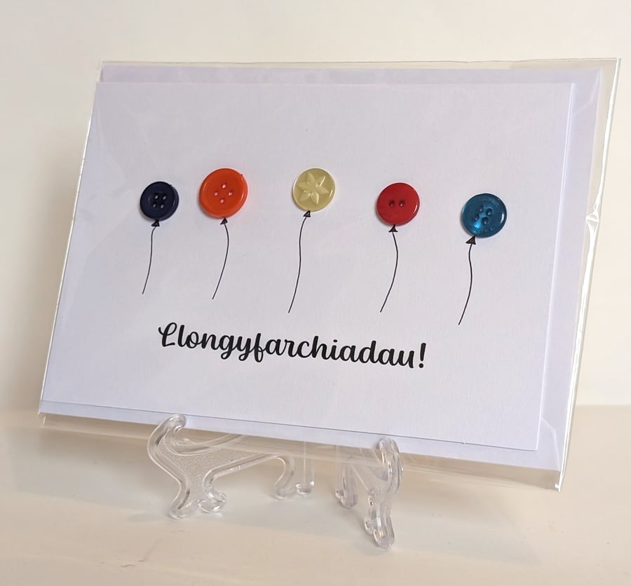 Llongyfarchiadau (Congratulations) balloon buttons greetings card Welsh