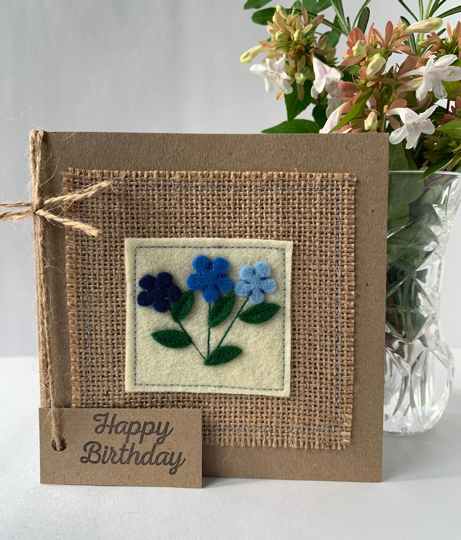 Handmade Birthday with blue flowers on cream wool felt. Keepsake card.