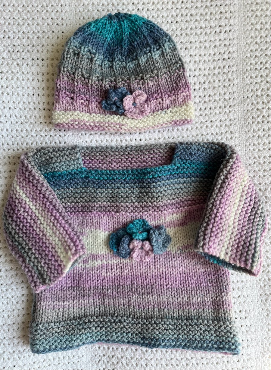 Knitted hydrangea baby jumper and matching hat set