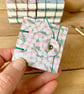 Coptic Bound Tiny Floral Watercolour Sketchbook. Pink, green and white.