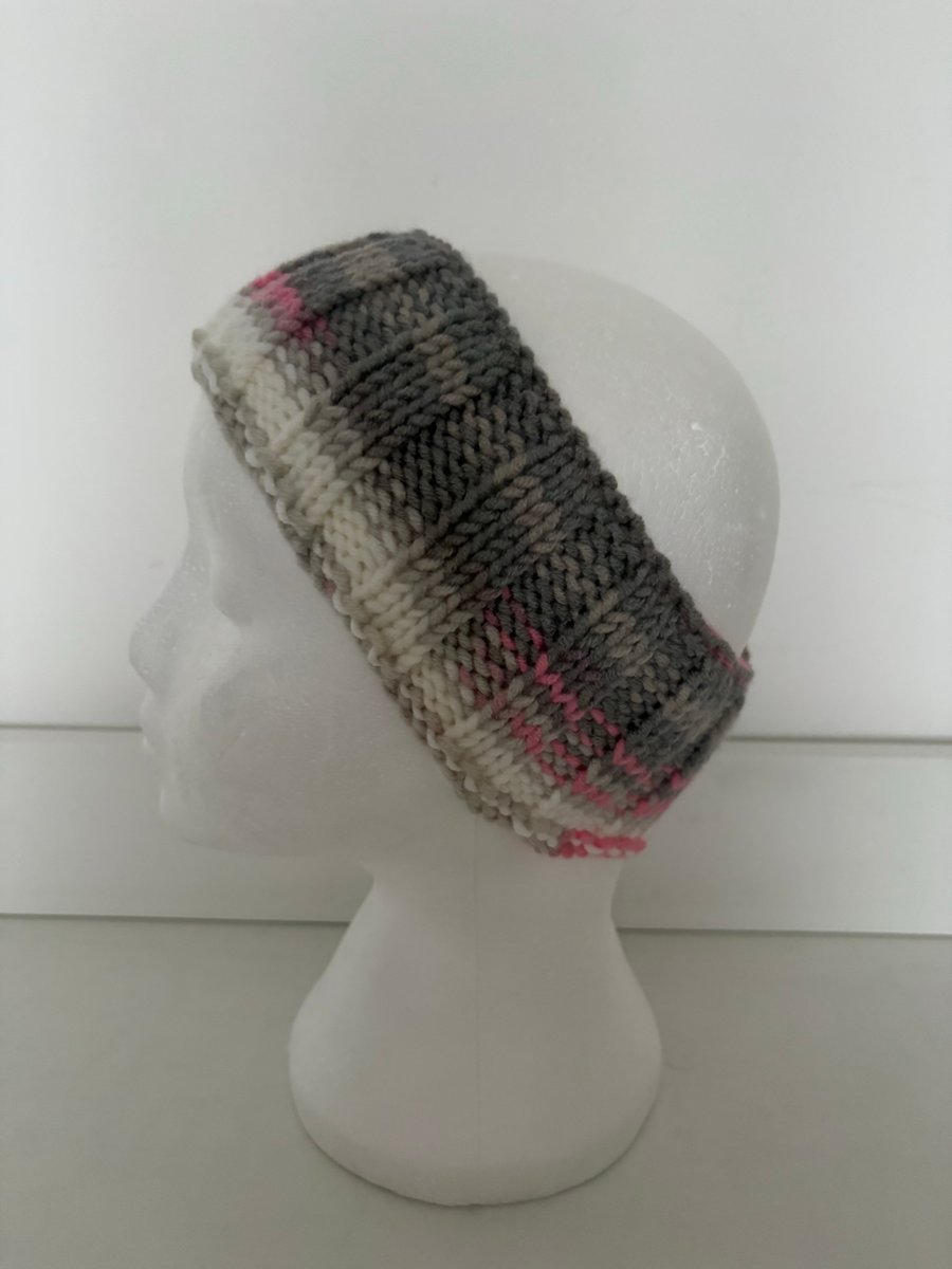 Hand knitted headband. 
