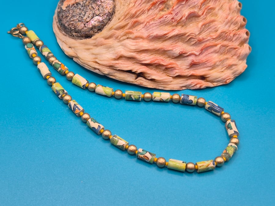 Pretty leaf motif paper beaded necklace with golden faceted separators