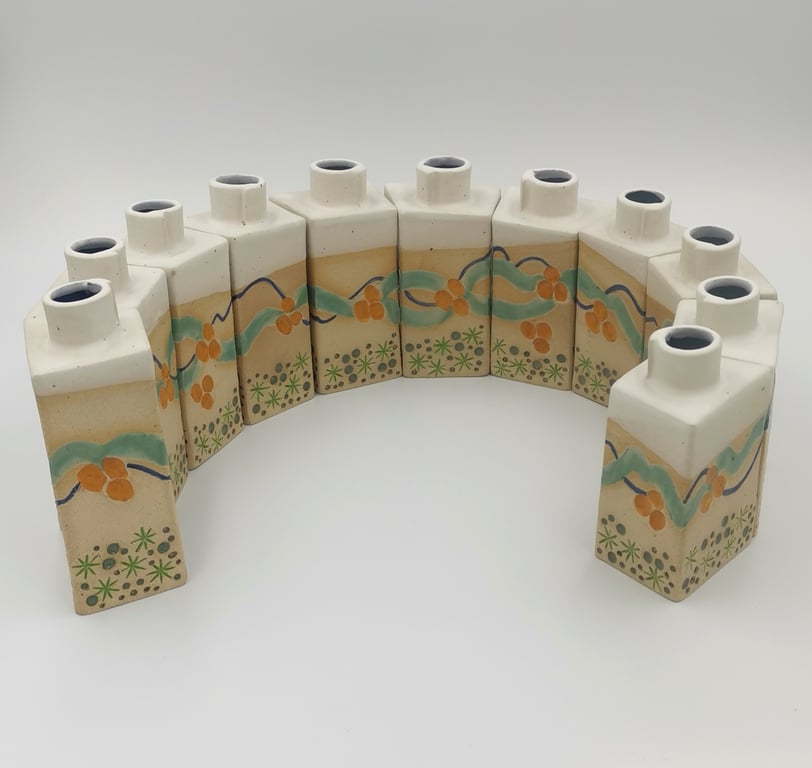 Set of 11 bud vase in a 'sweeping coast' design