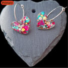 .Confetti Glitter filled resin heart earrings.