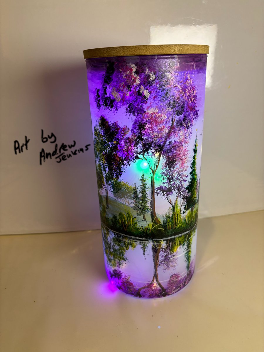 A hand painted and fired glass vase with lid by Andrew Jenkins 