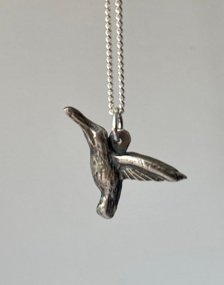 Unusual silver hummingbird necklace. 