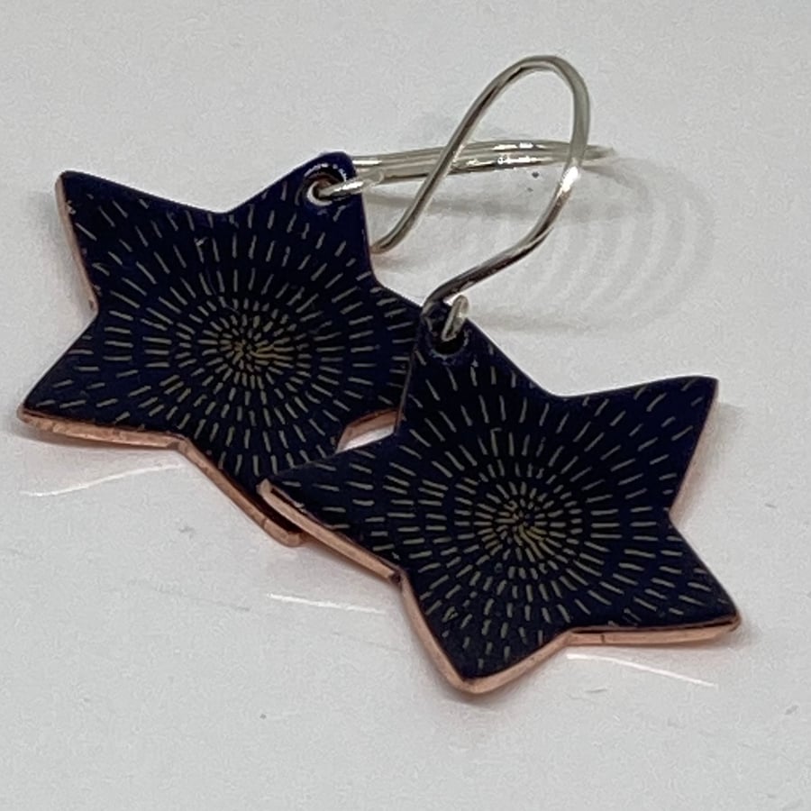 Star shaped enamel earrings