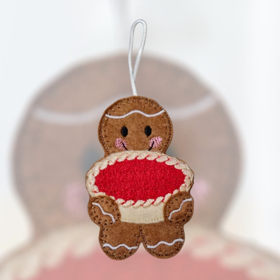 Gingerbread person holding a jam tart Embroidered Hanging Keepsake 