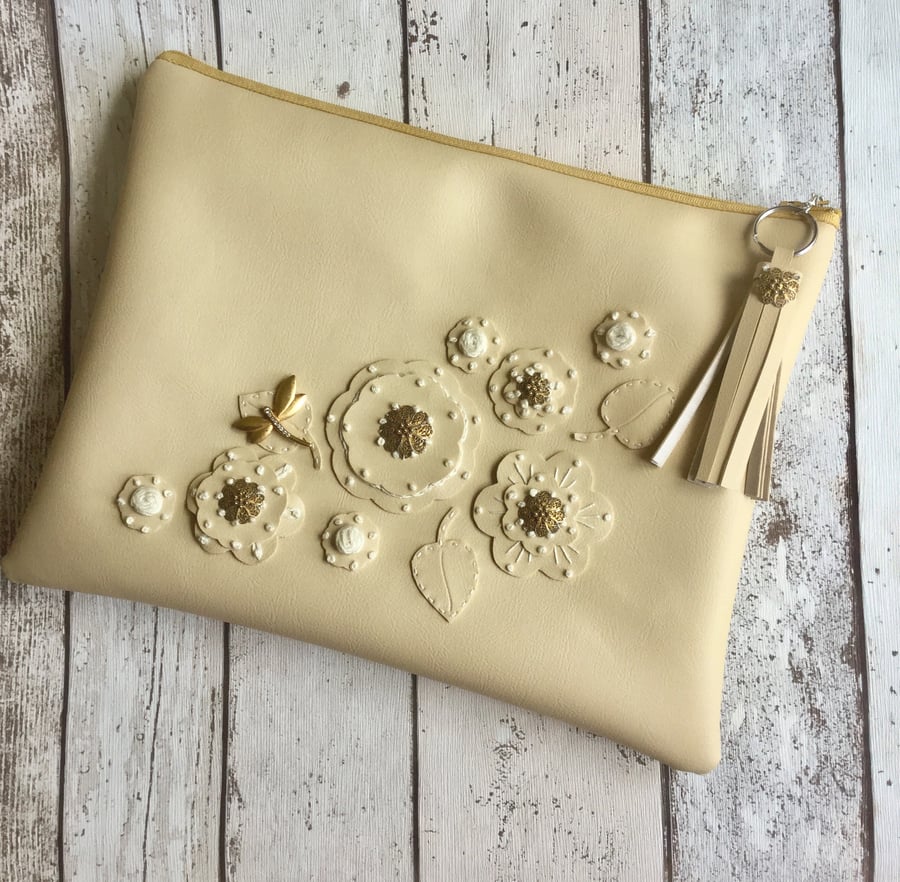 Cream Faux Leather Clutch with Flower Detail.