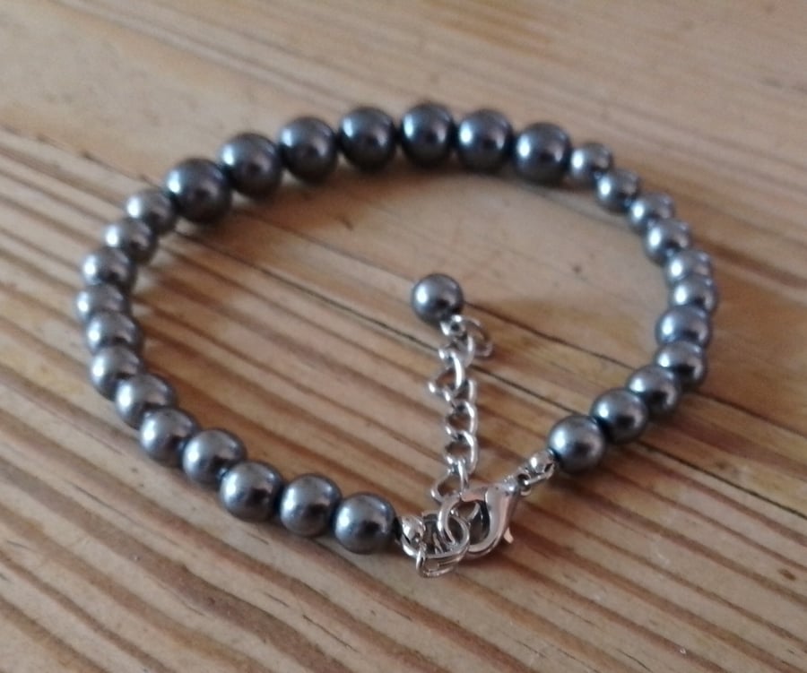 Handmade bracelet made using pre-loved beads.