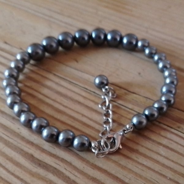 Handmade bracelet made using pre-loved beads.