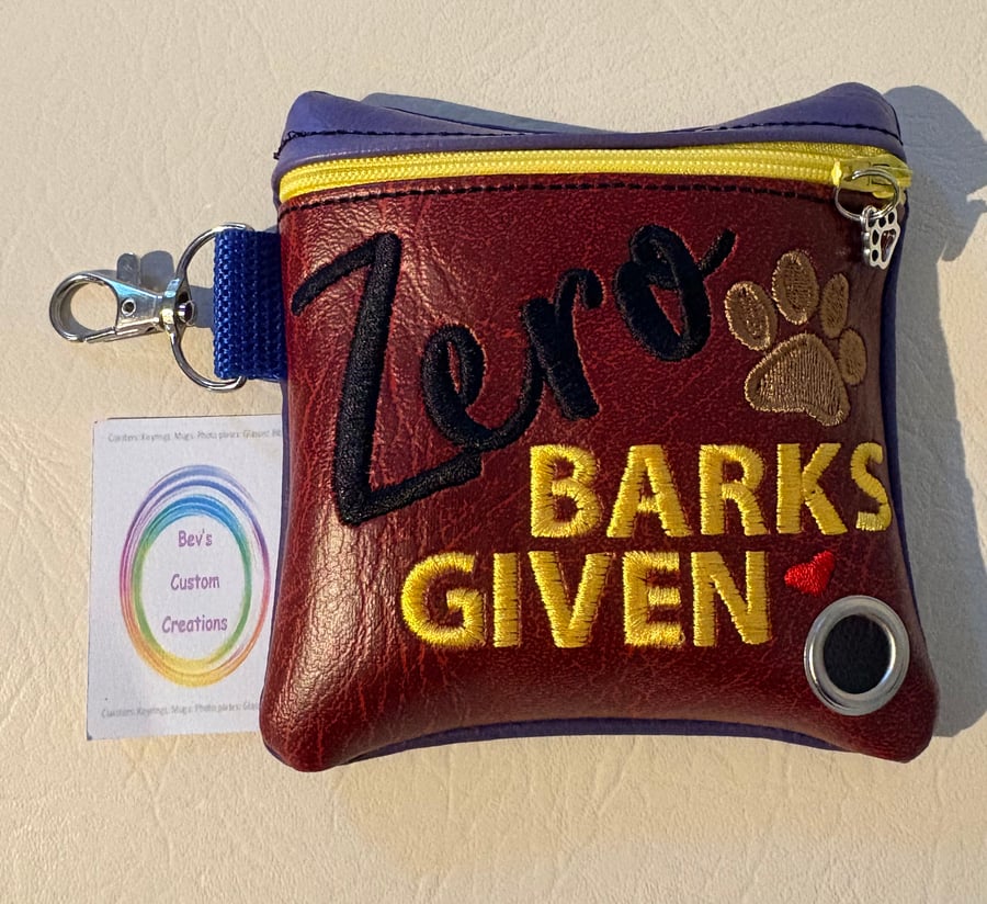 Zero Barks -  Embroidered Poo bag dispenser. 