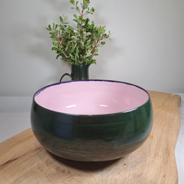 A HAND MADE STONEWARE SALAD, FRUIT BOWL - glazed in dark green and pink