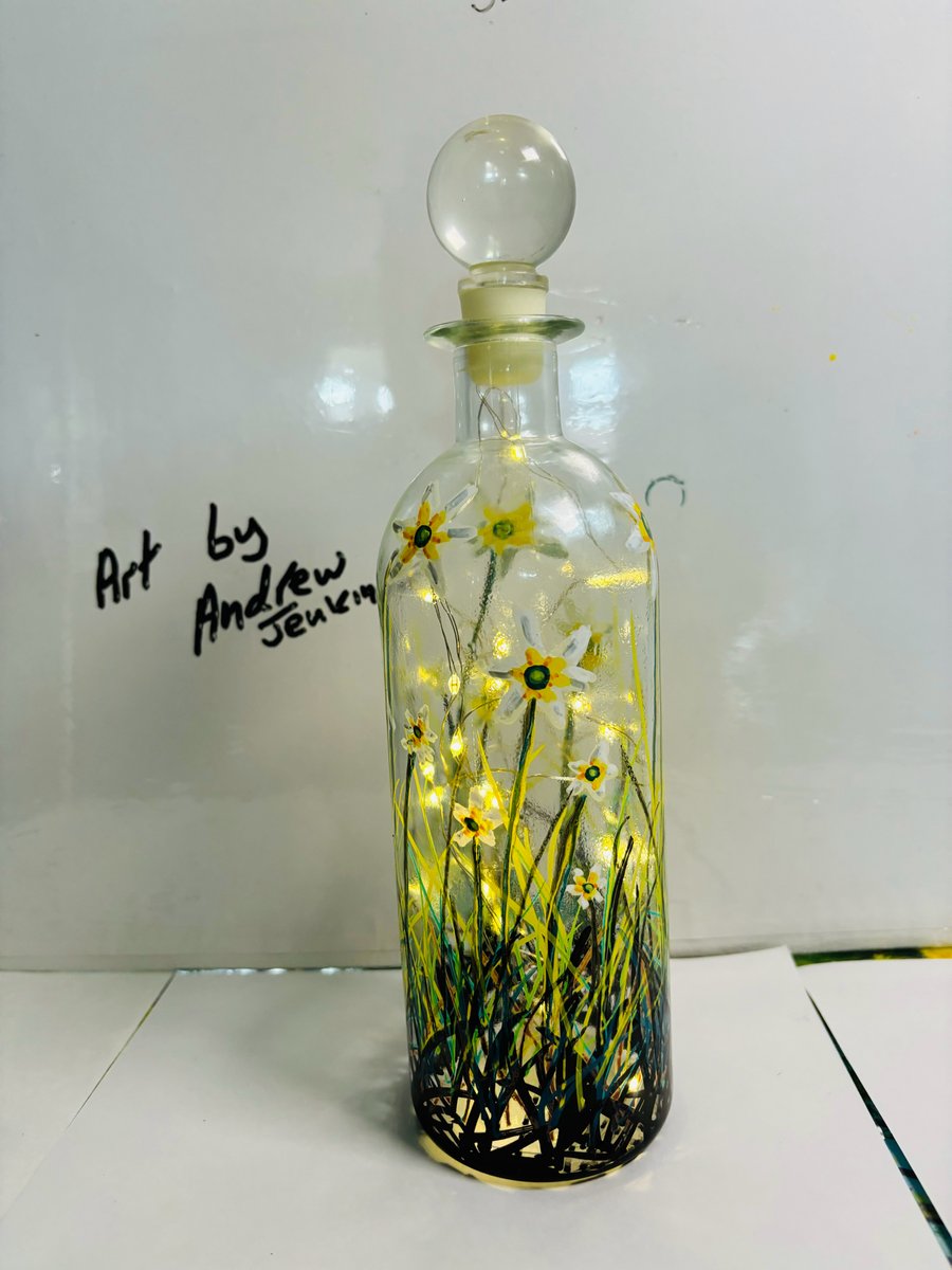 A hand painted and fired glass bottle with glass stopper by Andrew Jenkins 