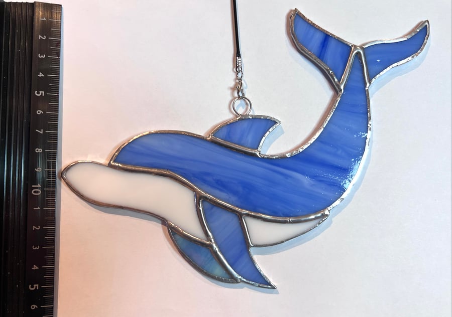 Handmade stained pearlescent blue glass dolphin sun catcher 