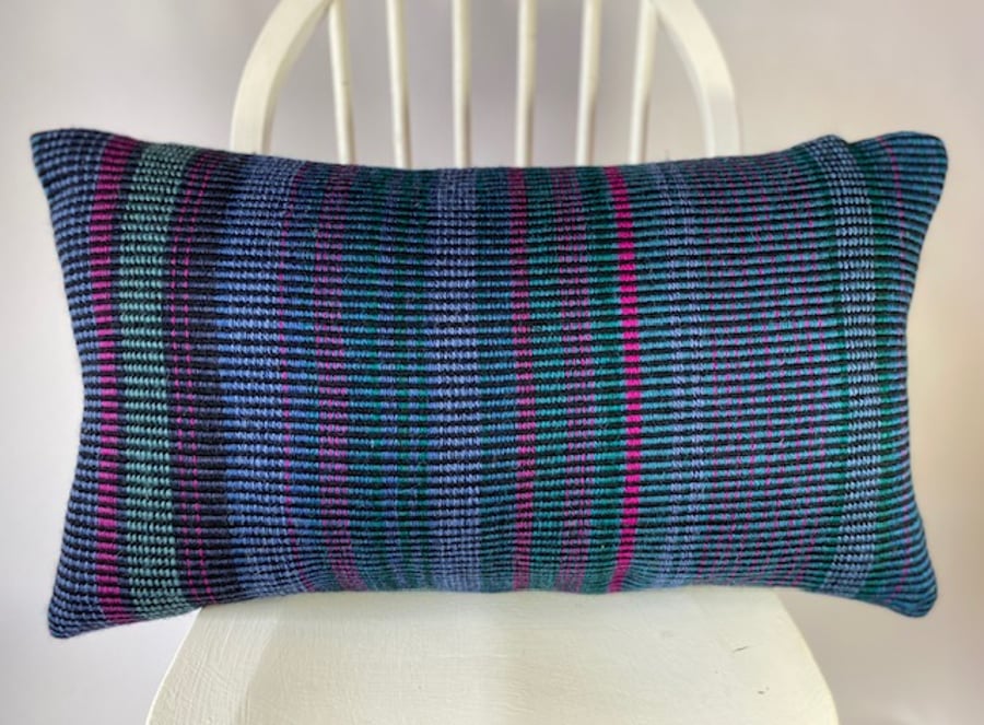 A Hand woven 100% wool cushion, designed and made by Yvonne Skelton