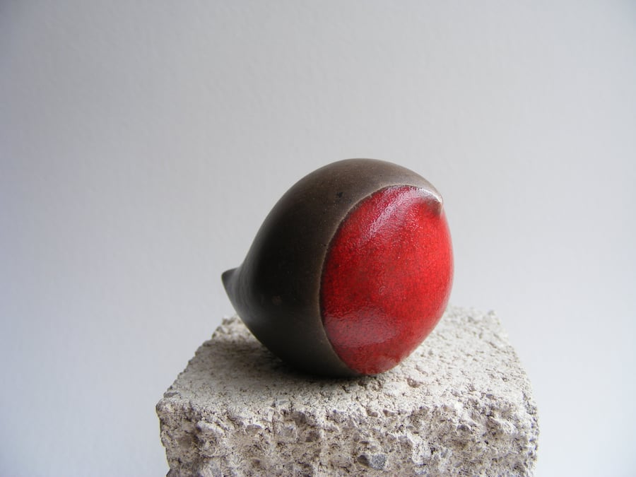 Raku glazed baby robin