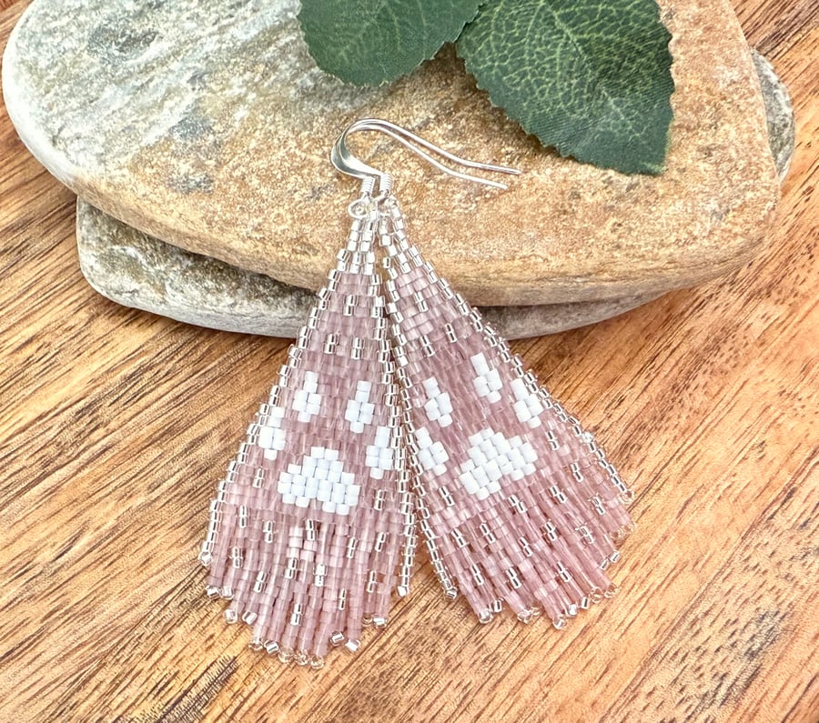 White wolf paw print beaded fringe earrings in rose pink and silver
