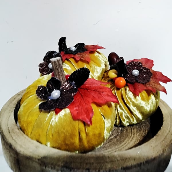 Handmade decorated plush velvet pumpkins in golden yellow, set of three.