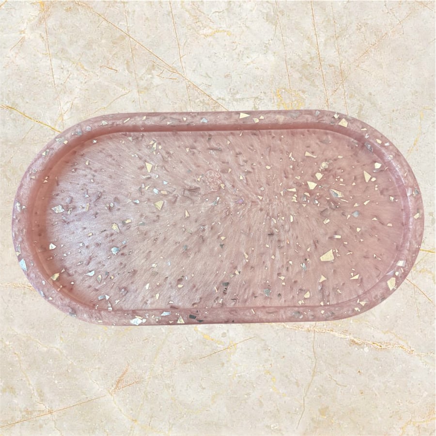 Resin made little dish to put bits in or your soap sponge fits in as well 