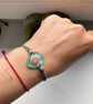 Handmade Woven Macrame women's bracelet with tiny shell