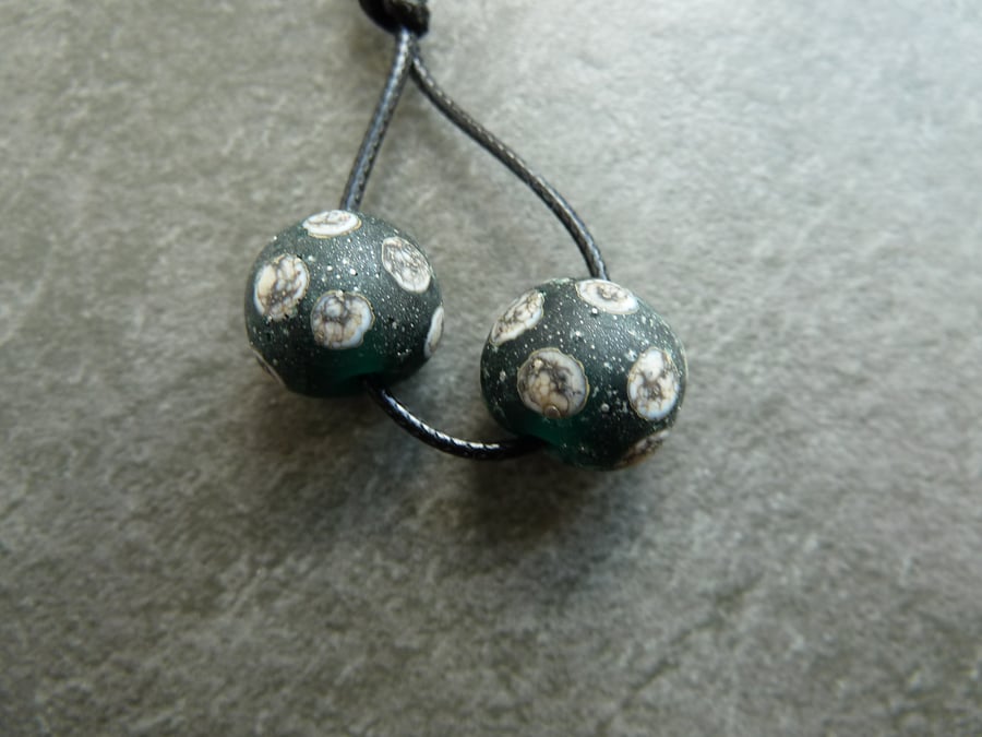 handmade lampwork glass beads, green spot sphere pair