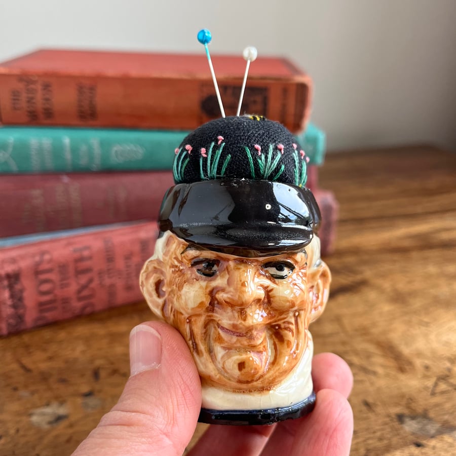 Pin cushion in repurposed vintage Fisherman pot embroidered flowers and bee