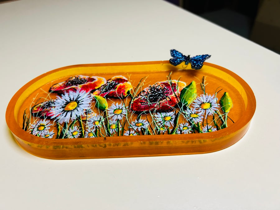 A hand painted and resin layered dish by Andrew Jenkins 