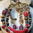 Multistrands bracelet, red black glass beads bracelet  , gold colour bracelet 