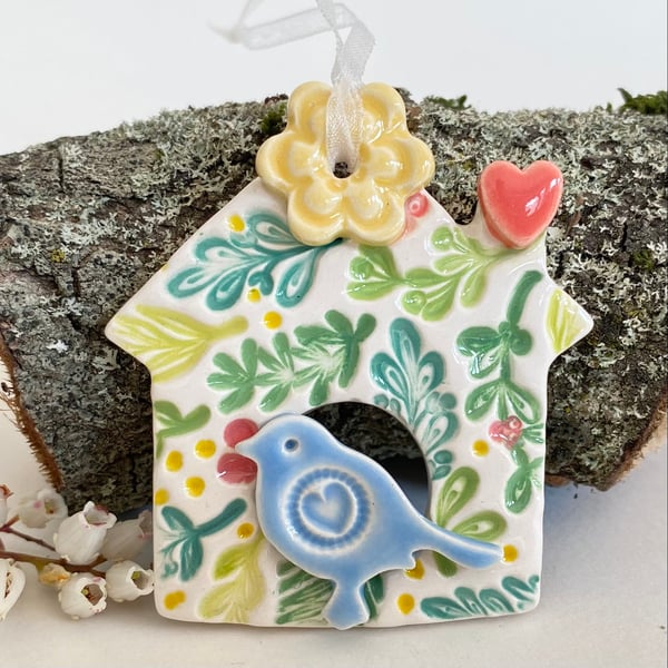 Small Ceramic bird house decoration with yellow flower