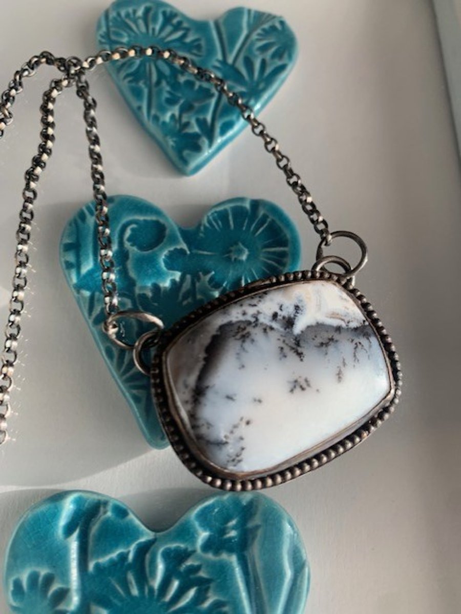 Sterling silver Dendric opal necklace with a Mountain secene 