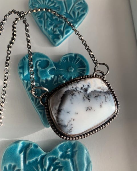 Sterling silver Dendric opal necklace with a Mountain secene 