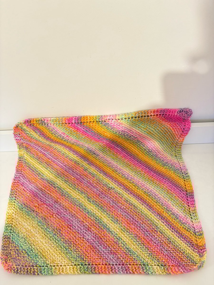 Hand knitted baby blanket. 