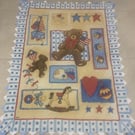 Hand quilted Playtime Baby Quilt or play-mat
