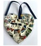 A beautiful heart shaped mosaic pendant featuring the letter B,E and E.