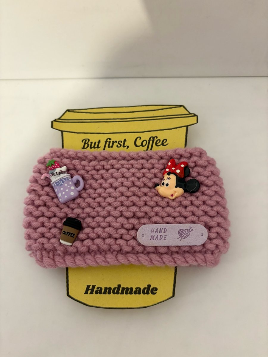 Minnie Mouse knitted cup cosy. 