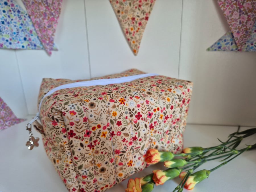 Padded floral toiletries bag