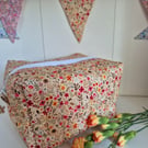 Padded floral toiletries bag