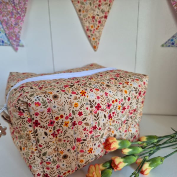 Padded floral toiletries bag