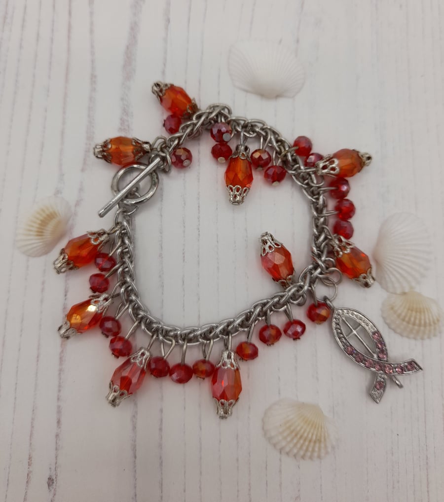 Red crystal ribbon charm style bracelet